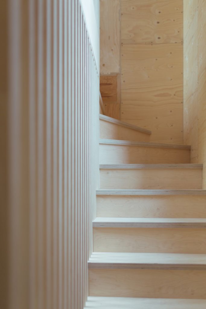 This is an interior staircase photograph of Box House. It is made of U-Build in collaboration with Studio Bark and has been featured on the Grand Designs TV show.