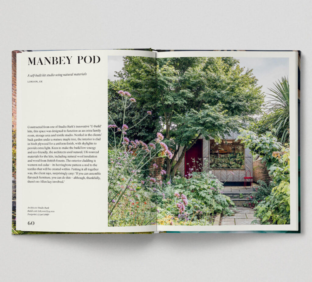 An open book displays a left page with text about the Manbey Pod garden studio, including its use of sustainably sourced materials, and a right page showing a lush garden with a small wooden pod surrounded by greenery and flowers.